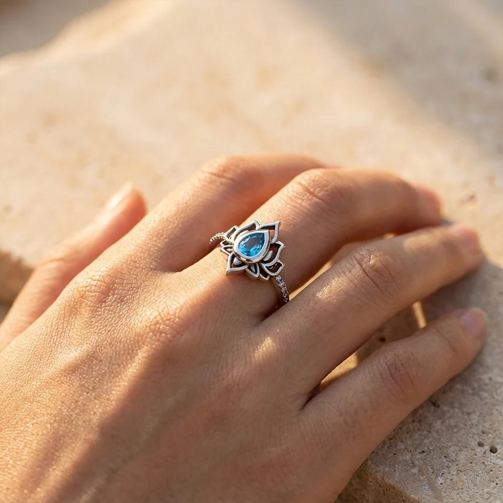 Lotus Rebirth™ Blue Zircon Ring