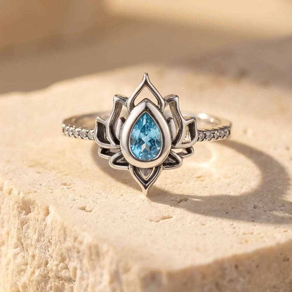 Lotus Rebirth™ Blue Zircon Ring